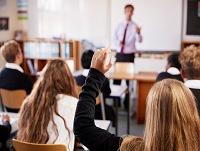 Image of teacher and pupils in classroom