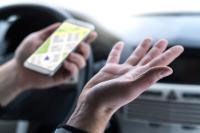 Mapping problems Image of man with phone in hand looking at map