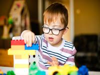 Image of boy playing Lego