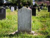 Image of a headstone in a cemetery