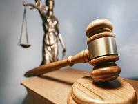 Image of a judge's gavel and the scales of justice