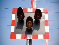 Image of level crossing lights and barrier