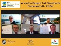 Image of Welsh screengrab of people signing Heads of Terms or Mid Wales Growth Deal