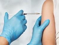 A person receiving their Covid-19 vaccine