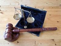 Image of a hammer and justice scales