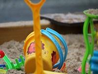 Image of a bucket and space in a sandpit