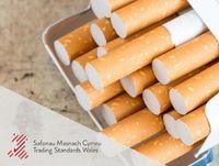 Image of cigarettes and the trading standards wales logo