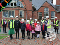 Image of pupils from Ysgol Gymraeg Y Trallwng with officials for Foundation for the Future ceremony