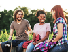3 young people sitting down