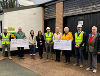 Image of a group of people at a donation handover