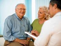 Image of an older couple with a doctor