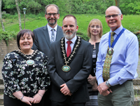 Photo caption: From left, Cllrs Beverley Baynham, James Gibson-Watt, Cllr Gareth Ratcliffe, Chief Executive Dr Caroline Turner and Cllr Jonathan Wilkinson