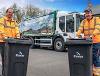 Image of two waste and recycling crew members