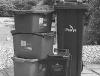 Image of bins and recycling boxes in black and white