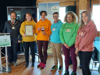 Image of people from Fuelled by Cake receiving their Silver Kite award