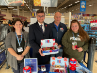 Image of Cllr Matthew Dorrance joins Poppy Appeal volunteers at Tesco in Llandrindod Wells to collection for this important cause.