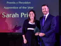 Sarah Price receiving award