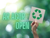 Image of a recycling icon and the words open