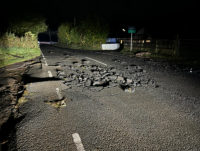 Image of the B4520 near Upper Chapel that was damaged by flood water