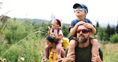 Children on Mum and Dad's shoulders