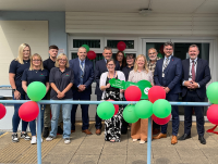 Image of Welsh Government Minister with representatives from Powys County Council