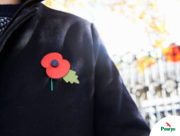 Image of a person wearing a poppy