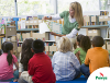 Image of a teacher reading to children