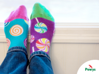 Image of a person wearing odd socks