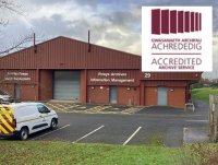 Powys Archives building with the Accredited Archive Service Logo in the top right