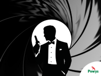 Image of a silhouette man in tuxedo holding a key