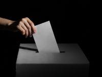 Image of a ballot box and black background