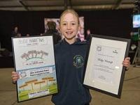 Image of Ruby Westrip with her winning design Image of Ruby Westrip with her winning design