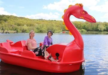 Image of 2 ladies sat in a dragon boat on Llandrindod Lake Image of 2 ladies sat in a dragon boat on Llandrindod Lake
