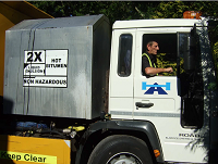 Image of a road surfacing lorry