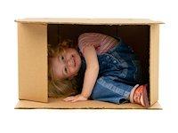 Image of a child in a cardboard box