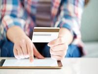 Image of a person making an online payment using a credit card
