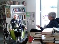 Image of two men talking to each other Image of two men talking to each other