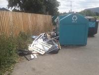 Image of fly-tipping outside recycling banks