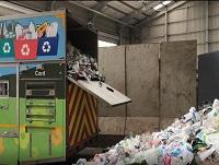 Image of plastic waste being dropped off