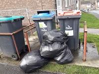 Image of fly-tipping outside flats in Ystradgynlais Image of fly-tipping outside flats in Ystradgynlais
