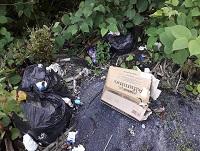 Image of rubbish fly-tipped in a layby Image of rubbish fly-tipped in a layby